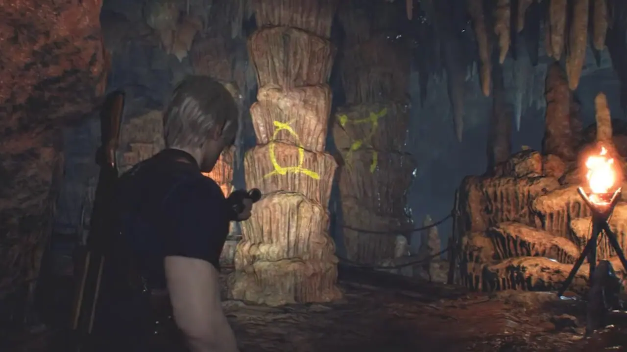 Загадка с символами в большой пещере в Resident Evil 4 Remake: где найти голову еретика Загадка с символами в большой пещере в Resident Evil 4 Remake: где найти голову еретика